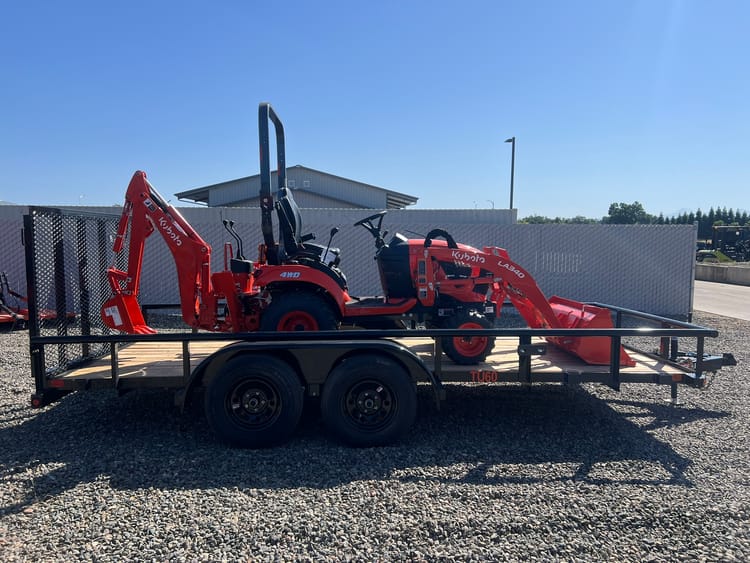 Kubota BX23S Tractor + 16′ Utility Trailer Package Deal